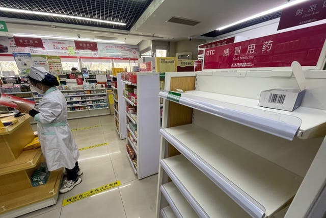 <p>Empty shelf of cold medicine at a pharmacy in Beijing</p>
