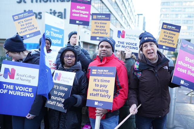 <p>RCN members on the picket line outside St Thomas’ Hospital in London</p>