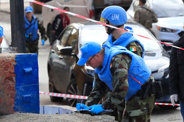 Irish UN peacekeepers investigate at the scene (Mohammed Zaatari)