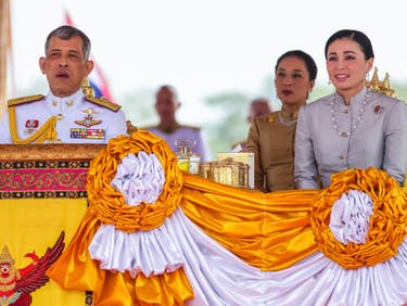 <p>Thailand’s King Maha Vajiralongkorn (L) is accompanied by Queen Suthida (R) and Princess Bajrakitiyabha Mahidol (C) as he presides the annual royal ploughing ceremony near the Grand Palace in Bangkok on May 9, 2019</p>
