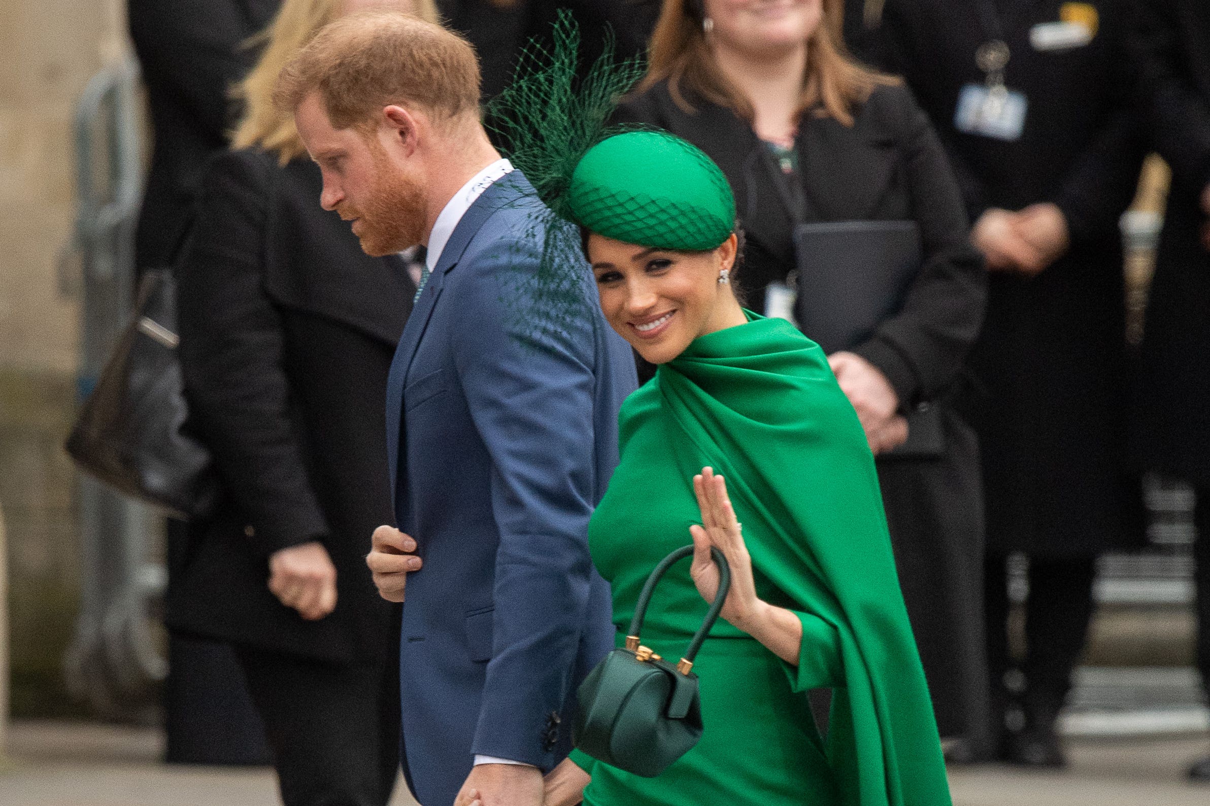 Meghan wore a bold green dress for her last royal appearance in the farewell tour