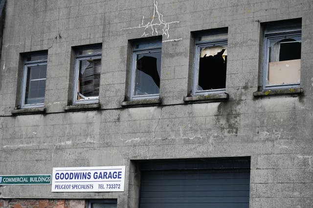 A damaged property near to the scene of an explosion and fire at a block of flats in St Helier, Jersey (Aaron Chown/PA)