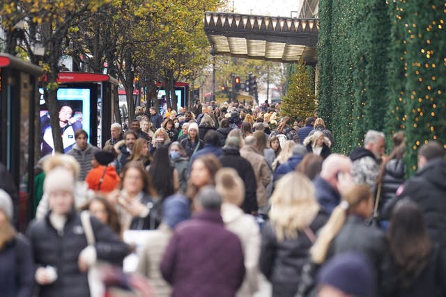High streets across the UK saw shopper numbers slump sharply early this week due to rail strikes and cold winter weather (PA)