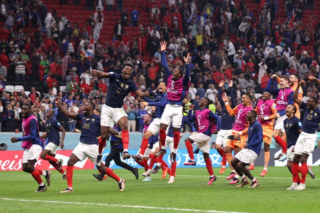 <p>France players celebrate after the team’s victory over Morocco</p>