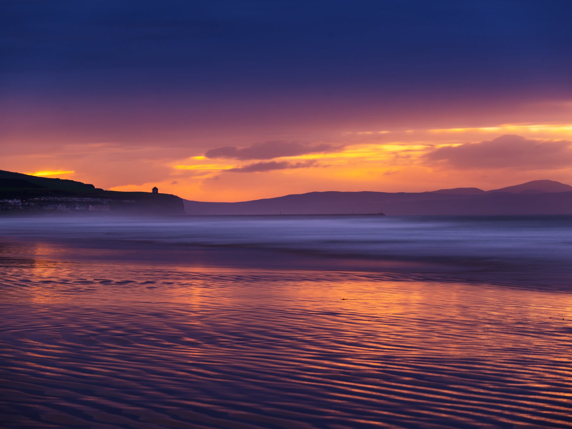 Golden coast: Northern Ireland’s Portstewart Strand at dusk
