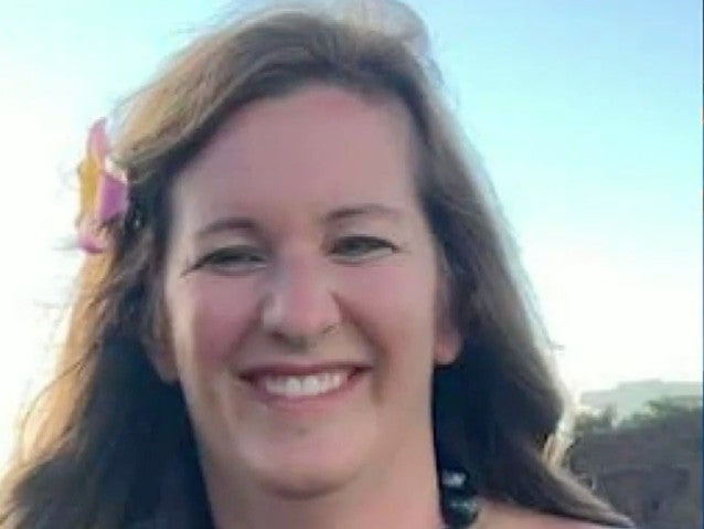 A woman who fatally shot two Mississippi police officers at a motel before killing herself has been identified as veterinarian Amy Brogdon Anderson who was in her car with her child