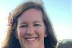 Woman who shot and killed two police officers identified as veterinarian, 43, who was in car with child