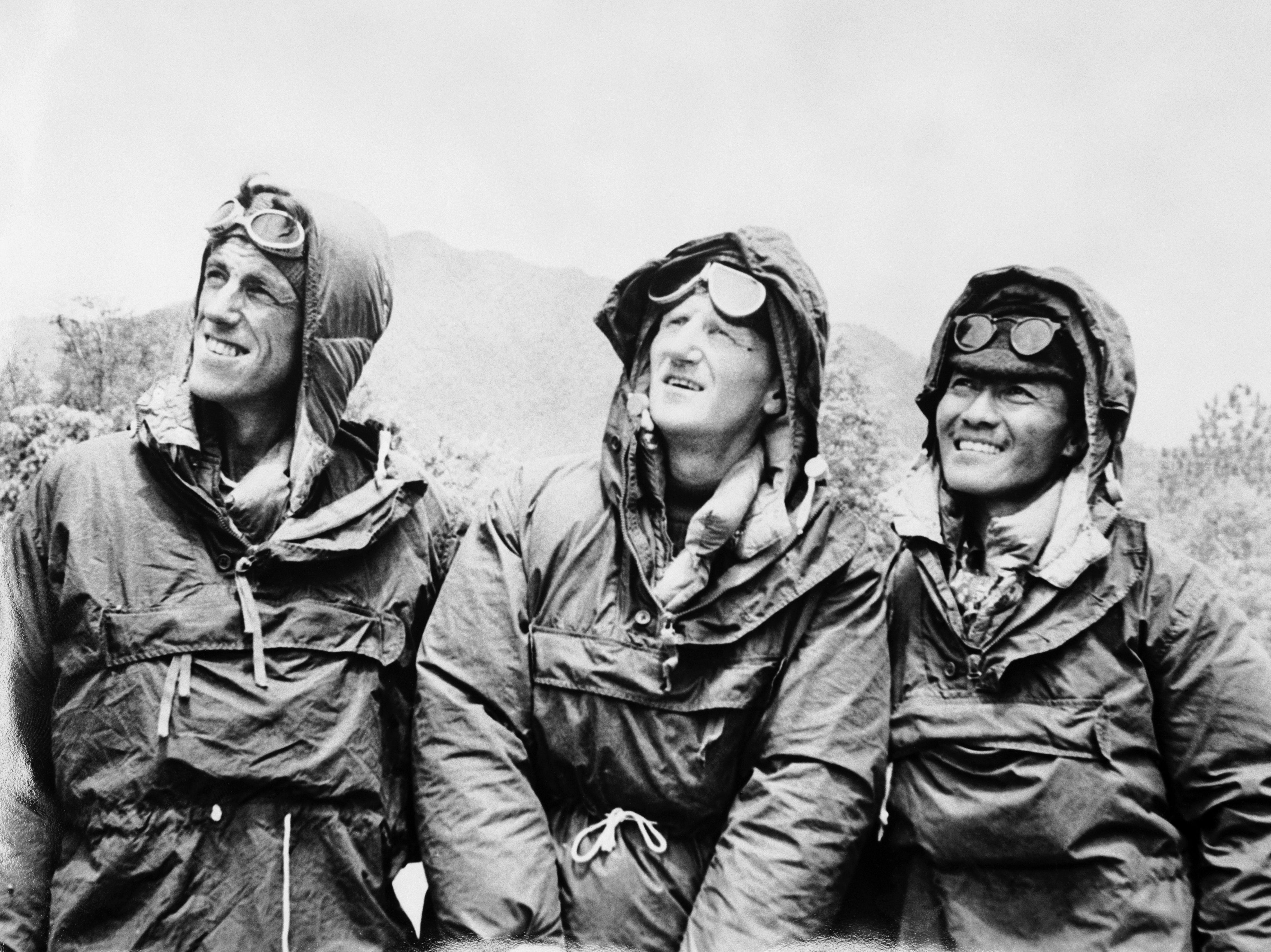 Edmund Hillary (left), Tensing Norgay (right) and expedition leader Colonel John Hunt in Kathmandu, Nepal, after descending from Everest in 1953