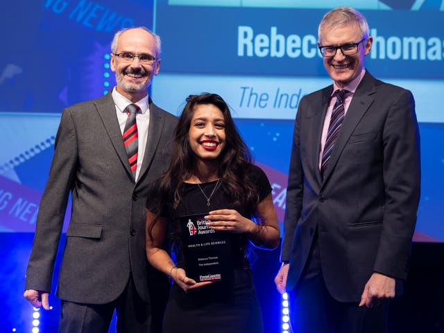 <p>Rebecca Thomas receives her award alongside host Channel 5 presenter Jeremy Vine (right) </p>