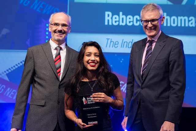 <p>Rebecca Thomas receives her award alongside host Channel 5 presenter Jeremy Vine (right) </p>