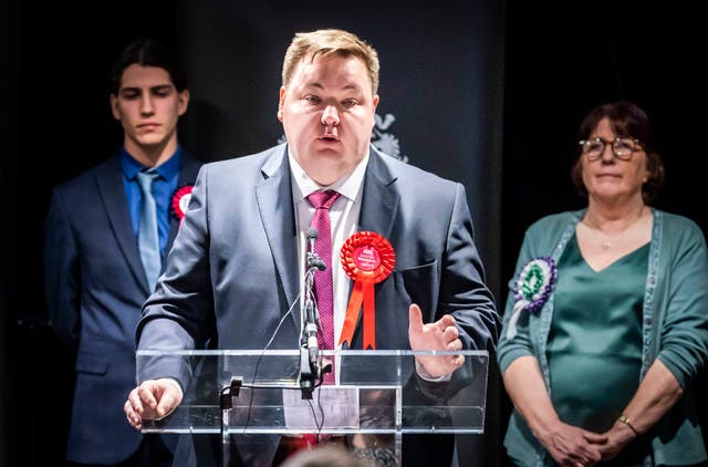 <p>Labour’s Andrew Western speaks after winning the Stretford and Urmston by-election in Manchester in the early hours of Friday</p>