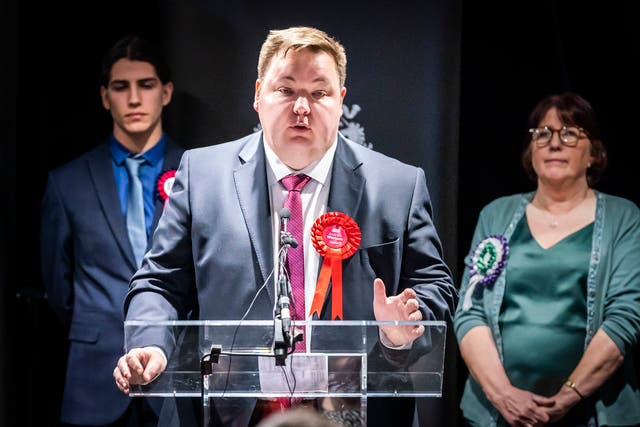 <p>Labour’s Andrew Western speaks after winning the Stretford and Urmston by-election in Manchester in the early hours of Friday</p>