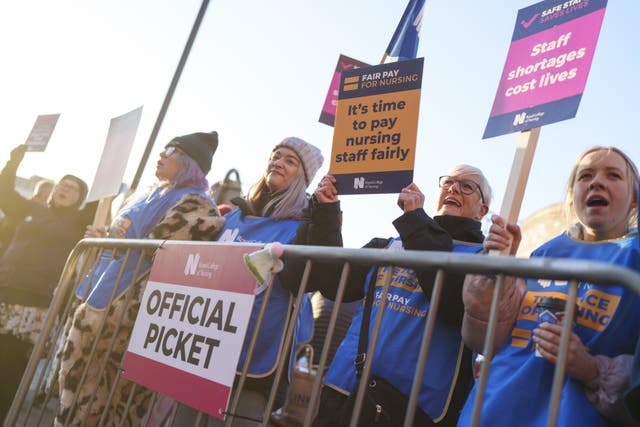 Members of the Royal College of Nursing on the picket line outside Leeds General Infirmary (PA)