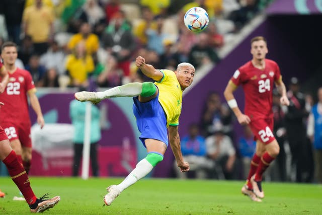 Brazil’s Richarlison scores one of his two outrageous goals at the World Cup (Peter Byrne/PA)