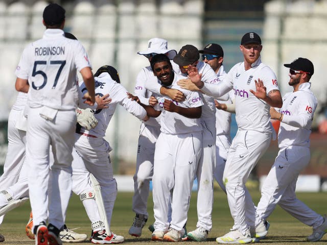 <p>Rehan Ahmed of England is congratulated by team mates on the wicket of Saud Shakeel of Pakistan </p>