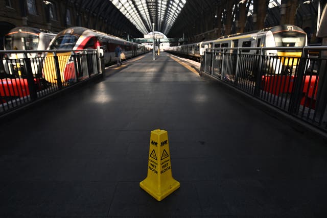 <p>A near-deserted King’s Cross station in central London on Saturday </p>