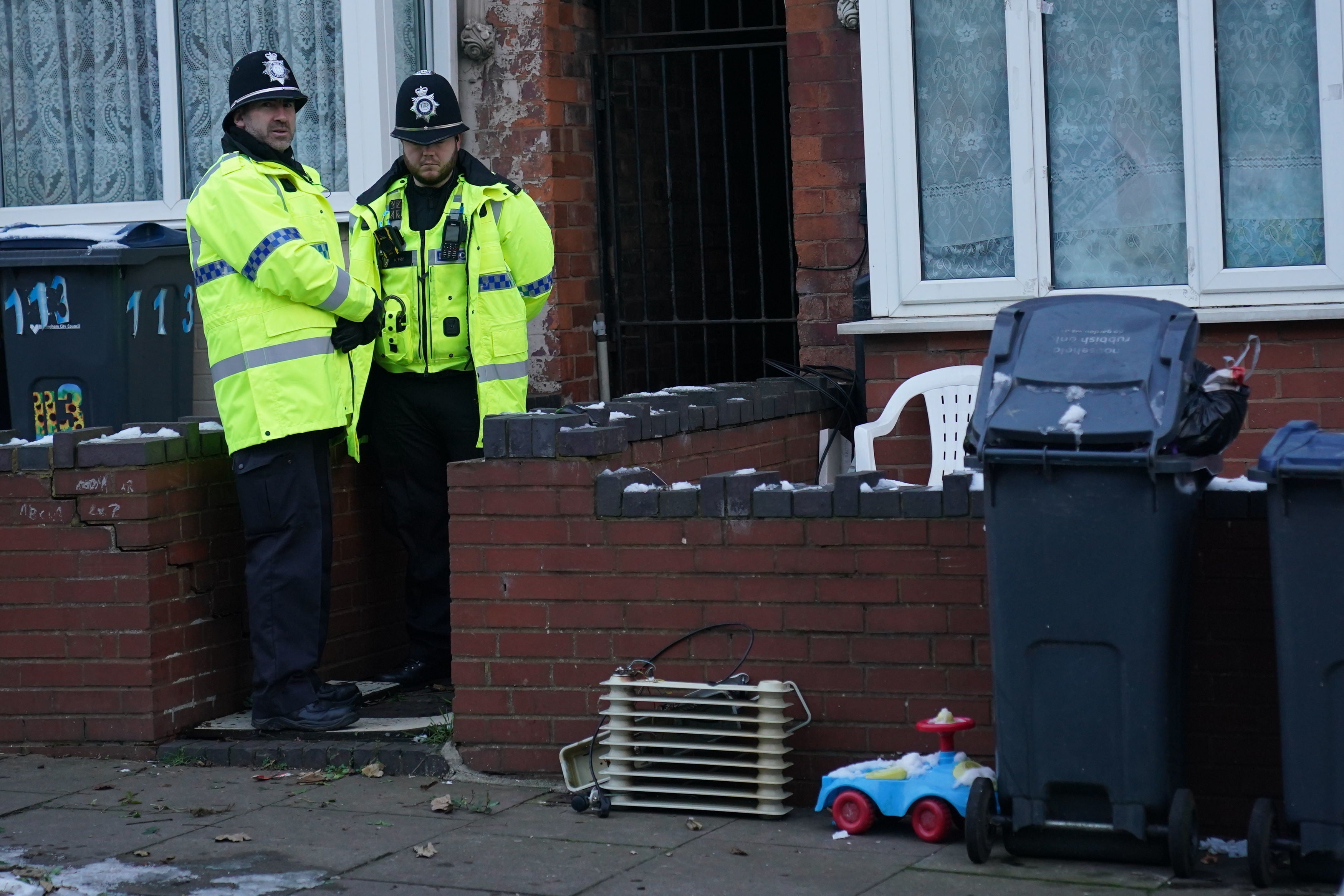 Police at a property in Handsworth, Birmingham, where searches have been taking place