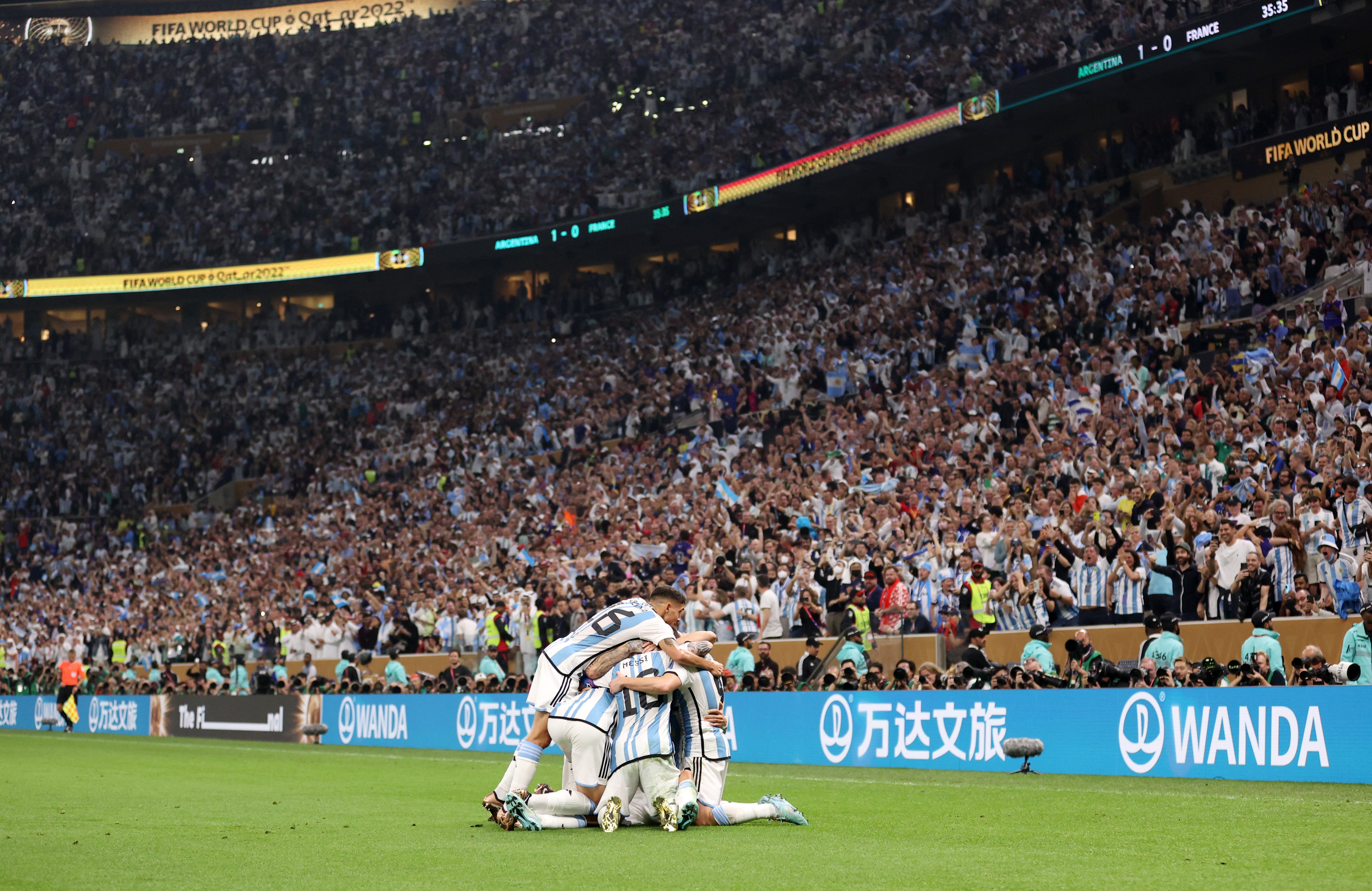 Argentina players celebrate their second goal