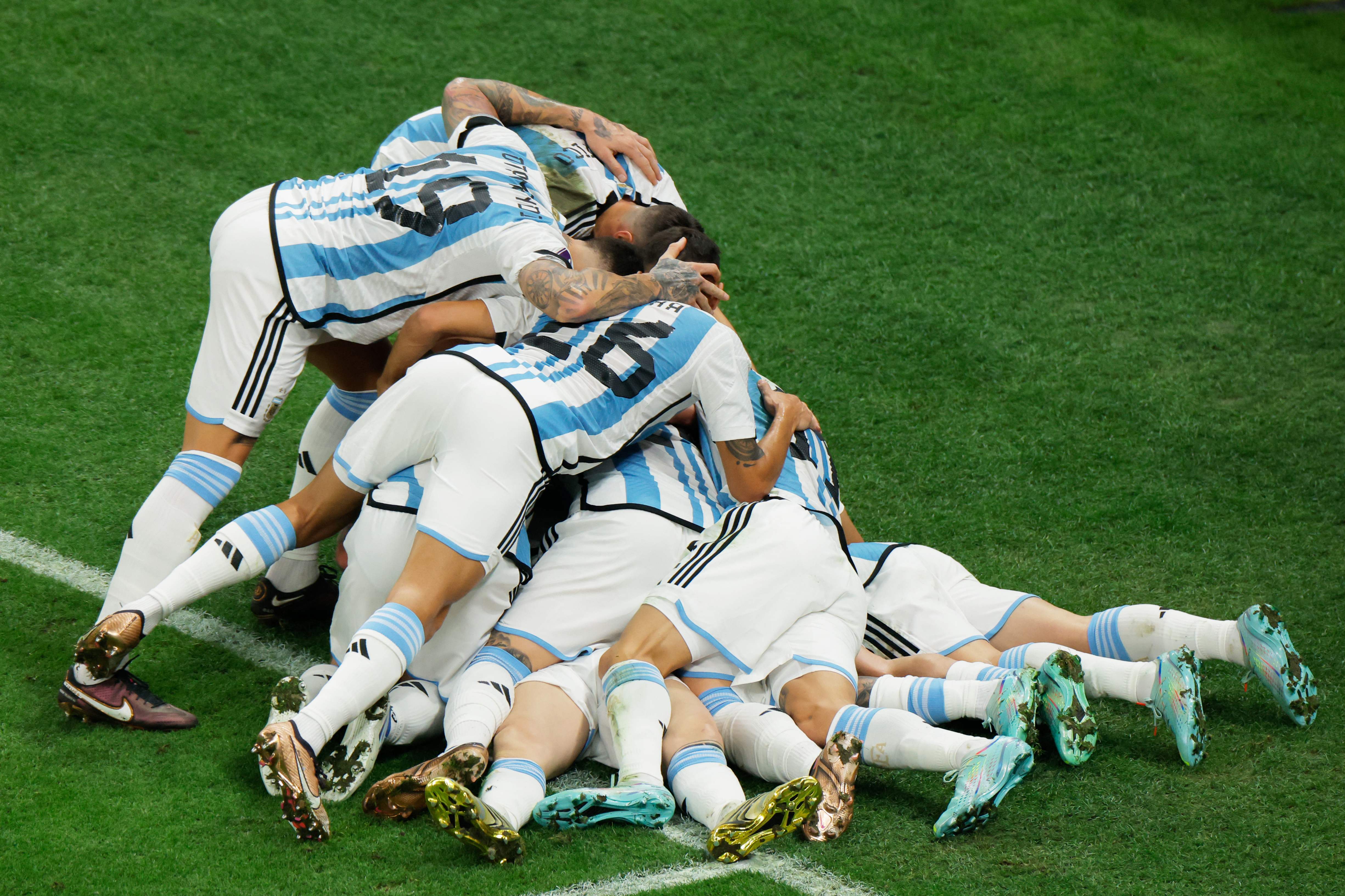 Argentina players celebrate their first goal