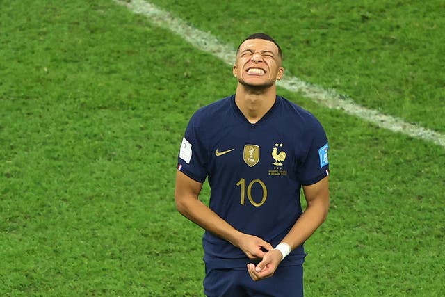 <p>Mbappe looks dejected after the match</p>