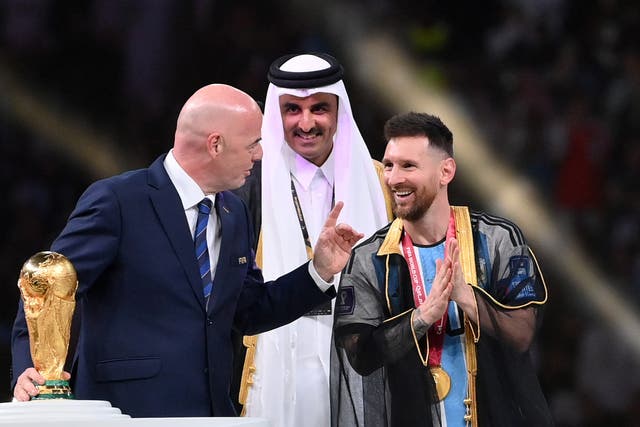 <p>Lionel Messi (right) with Fifa president Gianni Infantino (left) and the Emir of Qatar</p>