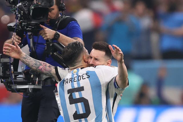 <p>Lionel Messi and Leandro Paredes celebrate winning the World Cup with Argentina </p>