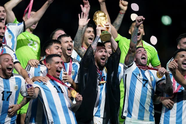 Lionel Messi lifts the World Cup trophy (Mike Egerton/PA)