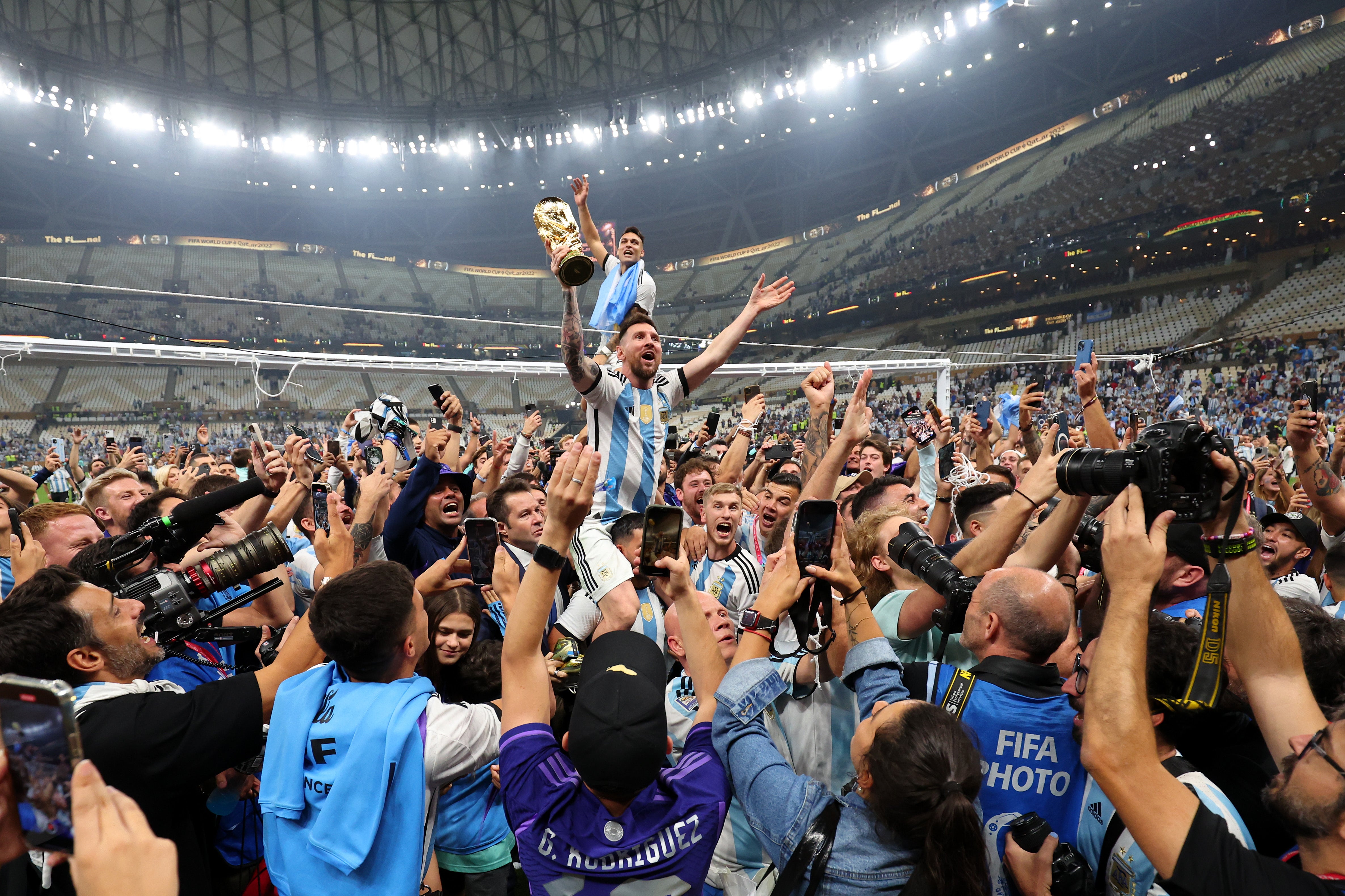 Messi is lifted into shoulders to celebrate the win