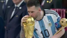 Lionel Messi kisses World Cup after winning the Golden Ball award