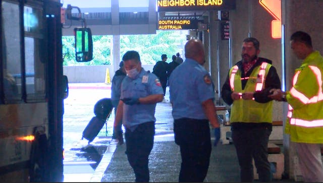 <p>This image taken from video provided by Hawaii News Now shows the scene outside the international airport in Honolulu after nearly a dozen people were seriously injured when a flight to Hawaii hit severe turbulence on Sunday, 18 December 2022</p>