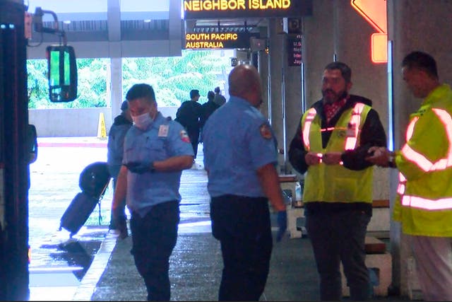 <p>This image taken from video provided by Hawaii News Now shows the scene outside the international airport in Honolulu after nearly a dozen people were seriously injured when a flight to Hawaii hit severe turbulence on Sunday, 18 December 2022</p>