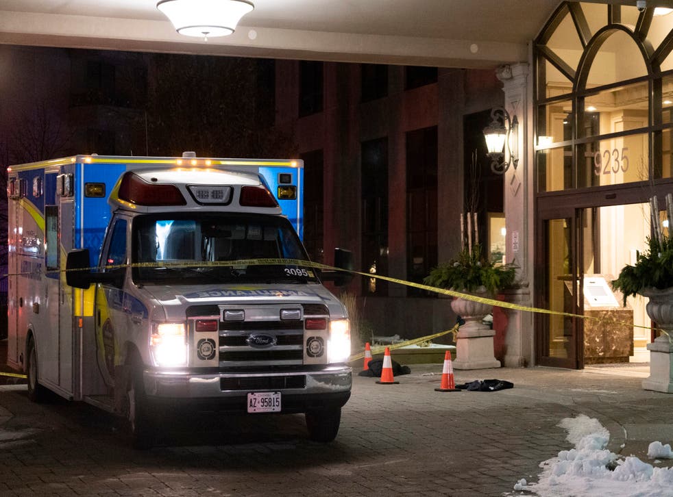 <p>An ambulance is parked outside the lobby of a condominium building following a fatal shooting in Vaughan, Ontario</p>