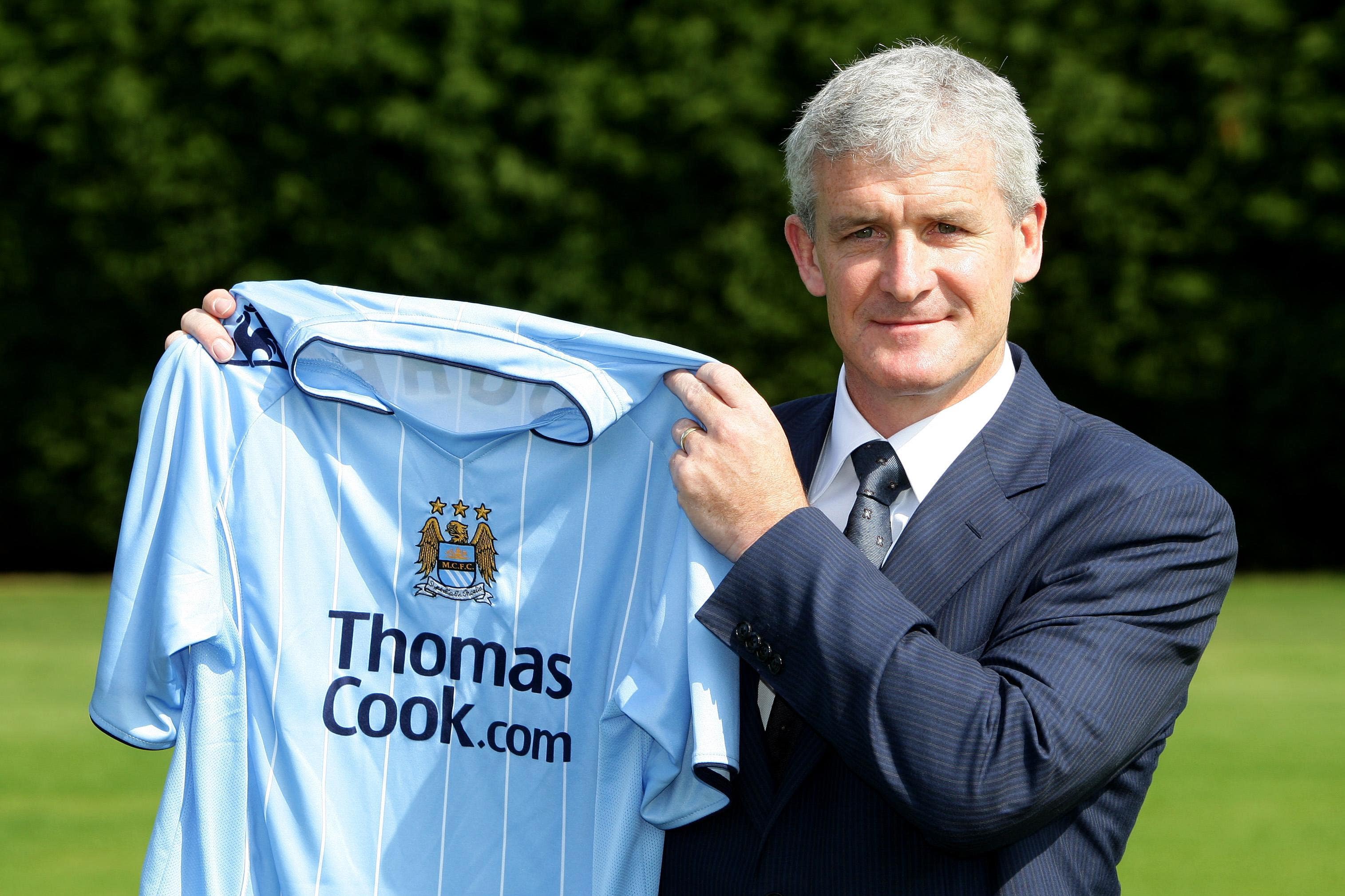 Mark Hughes was sacked and replaced by Roberto Mancini on this day in 2009 (Martin Rickett/PA)