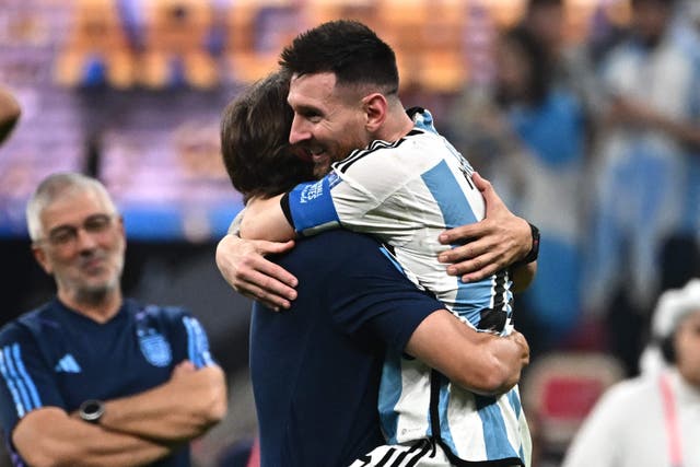 <p>Argentina’s forward Lionel Messi celebrates with Argentina’s coach Lionel Scaloni</p>