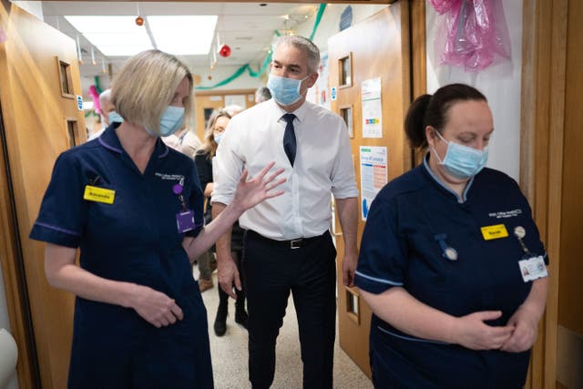 Health Secretary Steve Barclay meets staff during a visit to King’s College University Hospital in London (Stefan Rousseau/PA)