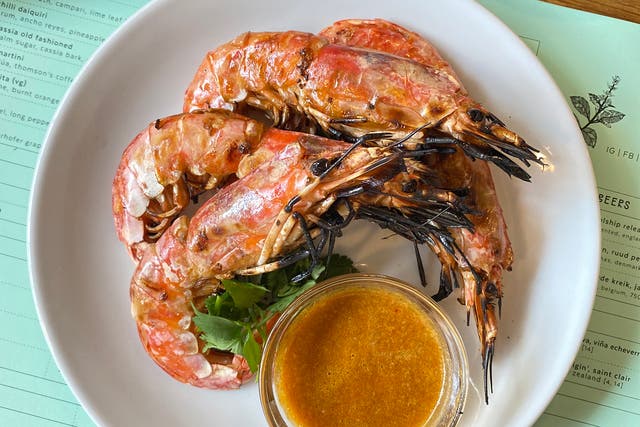 <p>A spicy Thai dipping sauce brings the heat to these grilled prawns </p>