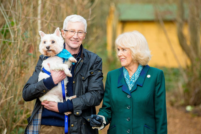 <p>The Queen Consort and Paul O’Grady in the festive special of For the Love of Dogs</p>