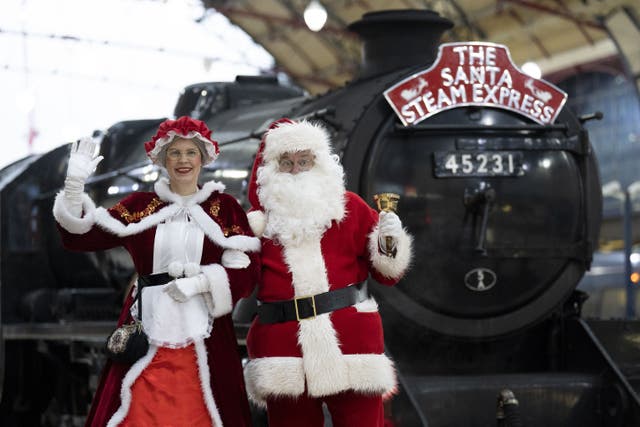 Santa Claus has returned to Victoria station to greet children on board the Santa Steam Express (Kirsty O’Connor/PA)