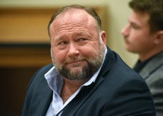 Bankrupt Alex Jones has $10m in assets, $100,000 in monthly expenses – and holds guns for Jan 6 defendants