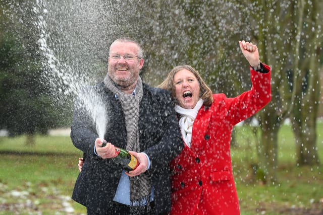 Eleanor Land and Karl Ward celebrate their ?1 million EuroMillions win (National Lottery/PA)