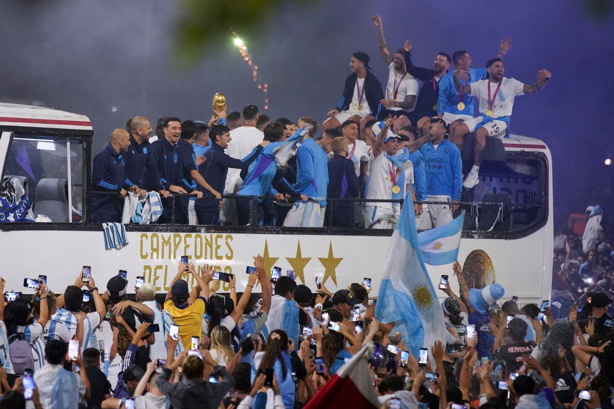 Fans line streets to greet world champions Argentina - in pictures