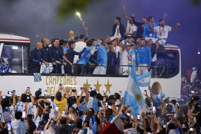 Argentina’s World Cup winning squad returned home on Tuesday (Matilde Campodonico/AP)