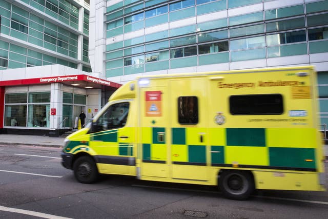 An ambulance goes past the emergency department of University College Hospital (Joshua Bratt/PA)