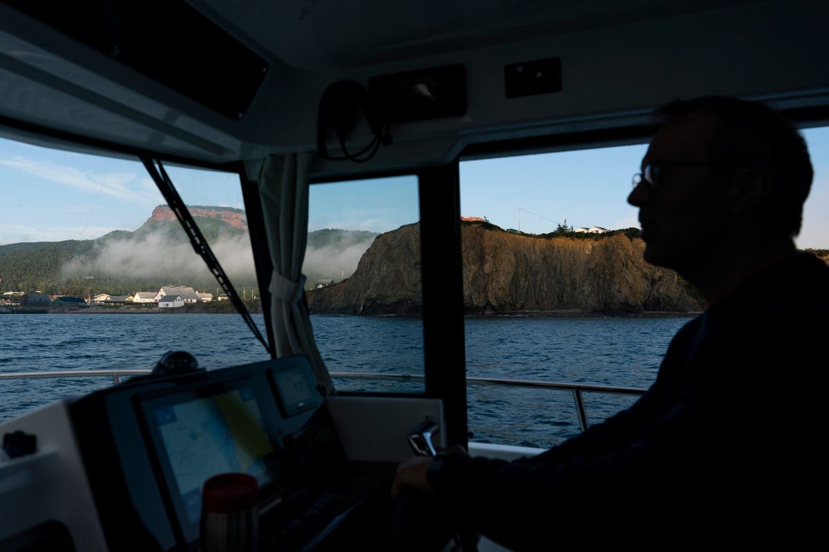 A ravaged Quebec coast fights climate change by retreating