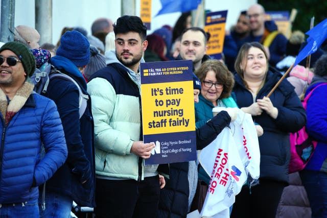 Members of the Royal College of Nursing on the picket line outside the RCN offices by Cardiff University Hospital, as nurses in England, Wales and Northern Ireland take industrial action over pay (Ben Birchall/PA)