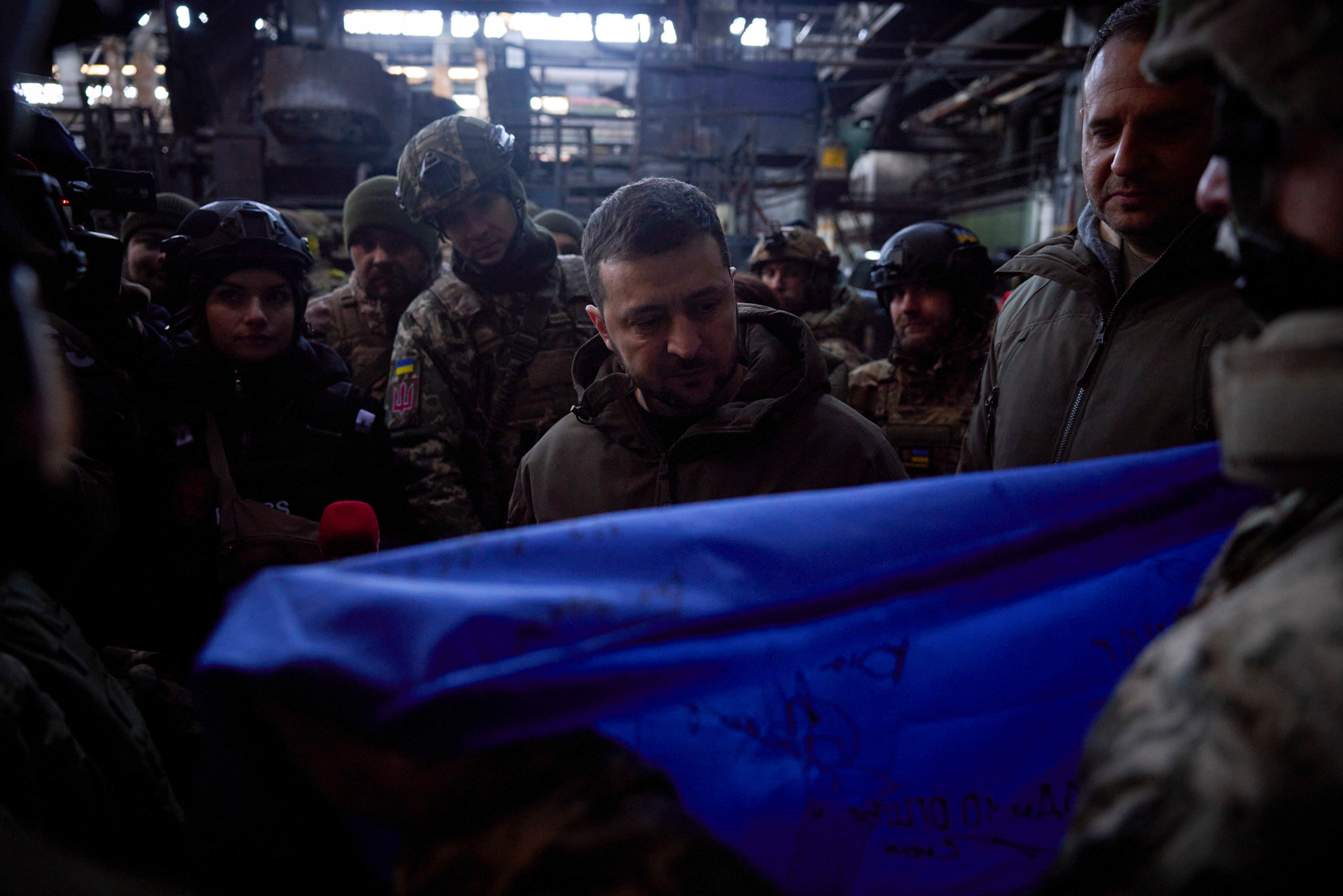 Ukrainian President Volodymyr Zelenskyy, signs a Ukraine national