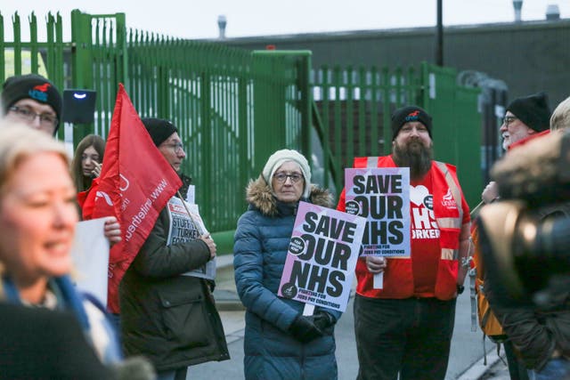 <p>A paramedic strike taking place outside Coventry’s West Midlands Ambulance headquarters</p>