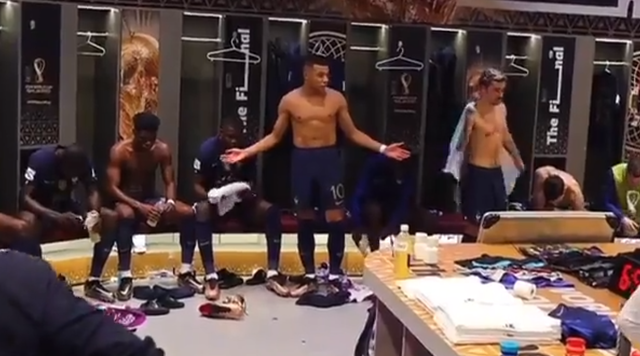 <p>Kylian Mbappe addresses his teammates at half-time</p>
