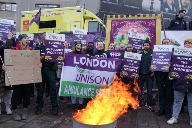 Ambulance workers on the picket line outside Waterloo ambulance station in London (Kirsty O’Connor/PA)