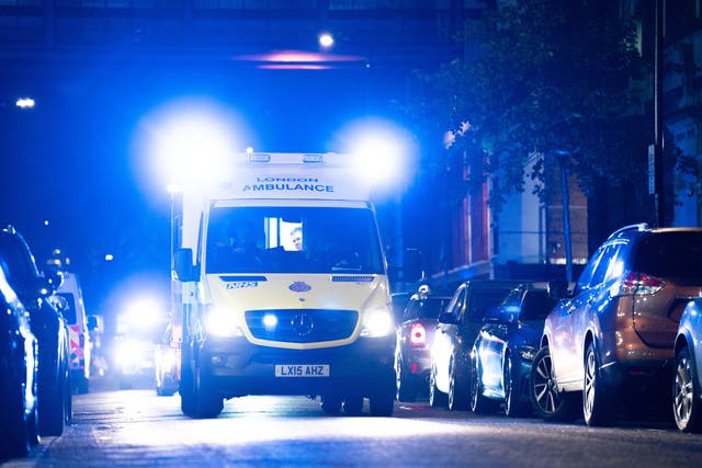 <p>An ambulance arrives at St Mary's Hospital, north west London </p>